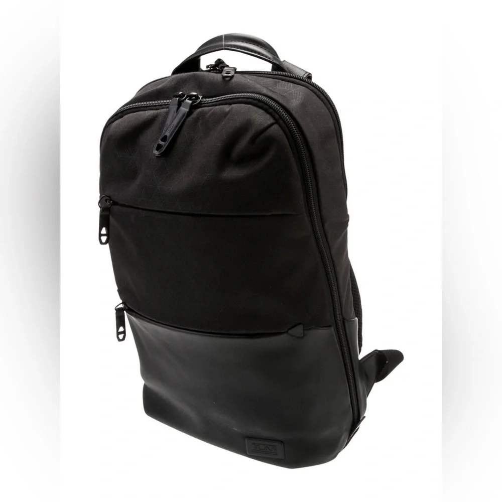 Like new Tumi Tahoe Elwood nylon backpack with leather accent